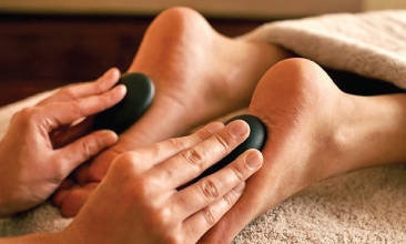 foot massage with hot stone